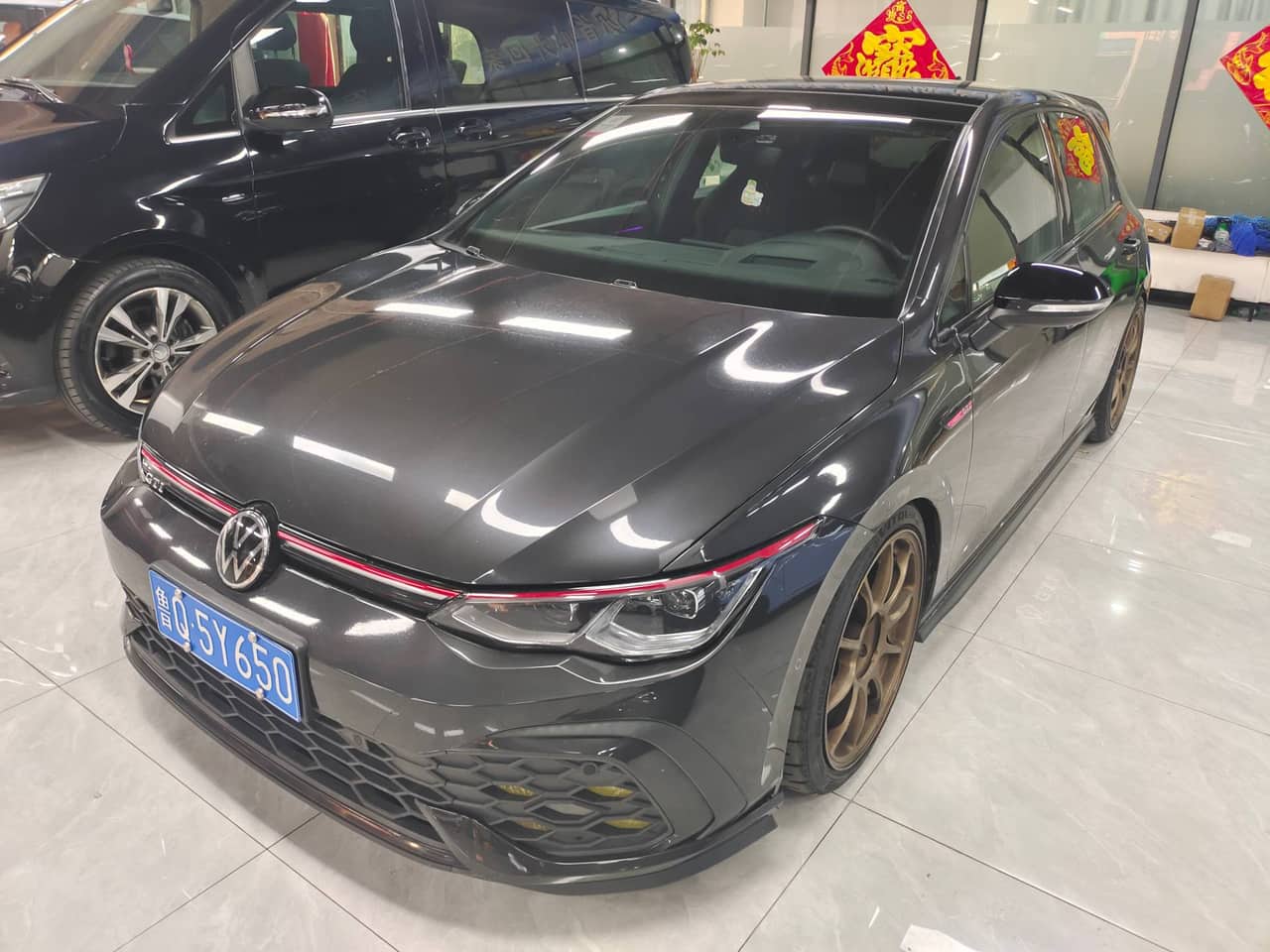2022 Volkswagen Golf GTI; curated vehicle image