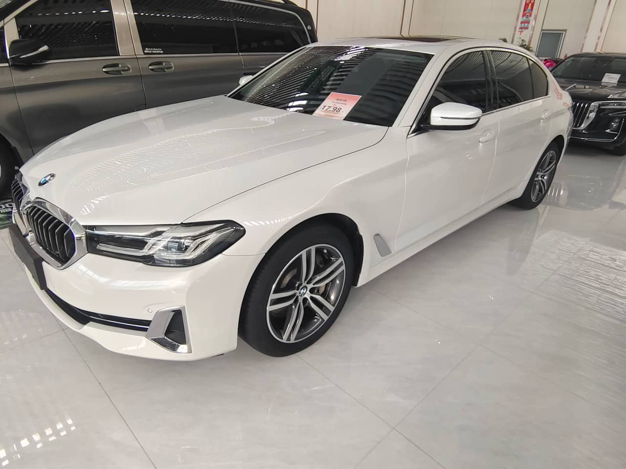2021 BMW 5 Series; curated vehicle image