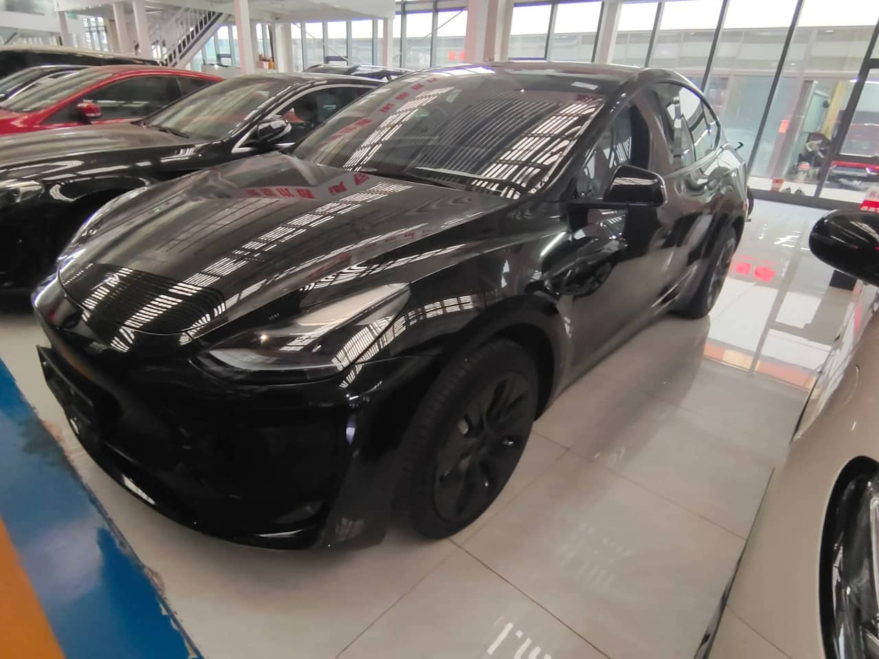 2023 Tesla Model Y; curated vehicle image